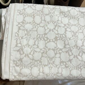 Garnet Hill organic cotton King duvet cover. Color is beige/sand with white.